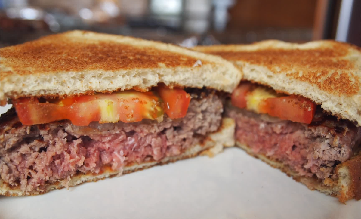 connecticut-take-a-bite-out-of-the-original-hamburger-from-louis-lunch-in-new-haven-which-actually-comes-on-white-bread-not-a-bun.jpg